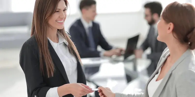 handing business card