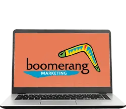 Laptop computer with Boomerang Marketing logo